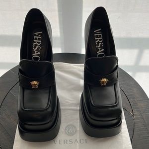 VERSACE
Embellished leather platform loafers